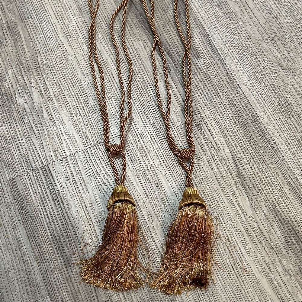 Metallic bronze coloured tassel curtain tie back holders. New.